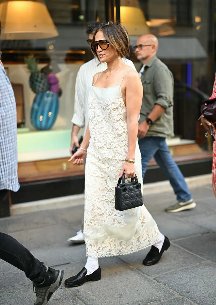 Jennifer Lopez white dress black loafers Paris