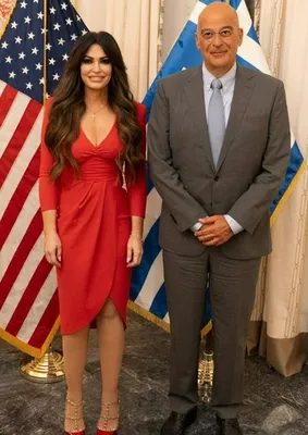 Kimberly Guilfoyle red dress Minister of National Defense