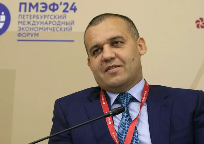 Russian oligarch Umar Kremle posing for the camera.