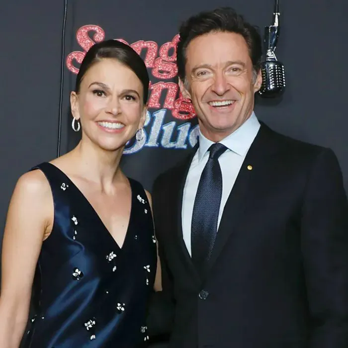 "Jennifer Aniston and Jim Curtis at an event"