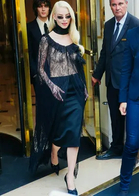 Anya Taylor-Joy exiting hotel for Dior fashion show.