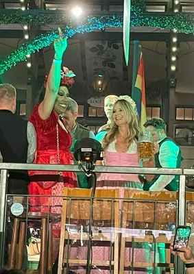 "Heidi Klum in a pink dirndl at Oktoberfest"