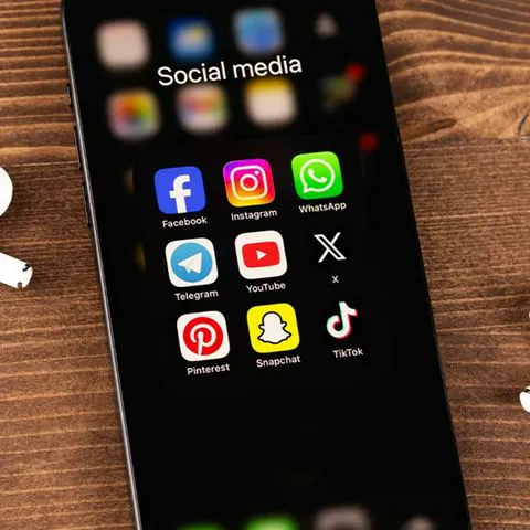 "Smartphone displaying various social media apps"