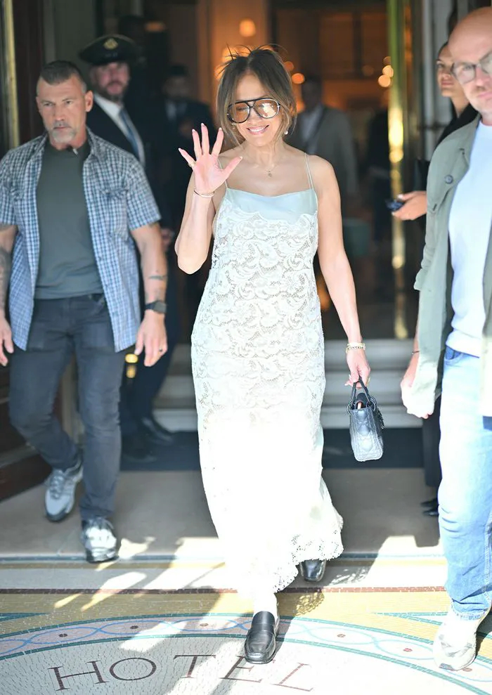 Jennifer Lopez white dress black loafers Paris