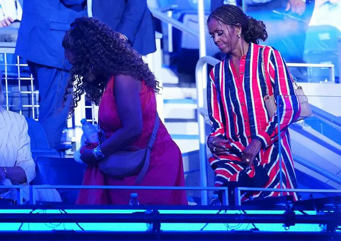 "Michelle Obama at the US Open in a striped dress"