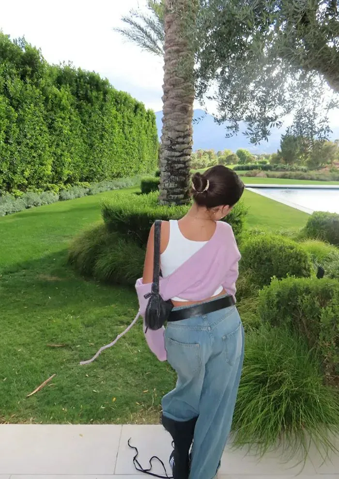 Penelope Disick in age-appropriate outfit at a public event.