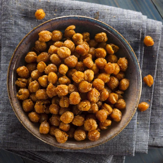 "Roasted chickpeas in a bowl with herbs"