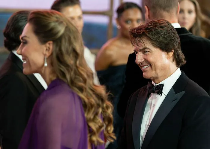 "Tom Cruise appearing smitten with Kate Middleton at the Digger premiere"