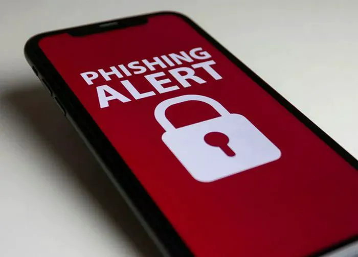 "Red phishing alert on an iPhone"
