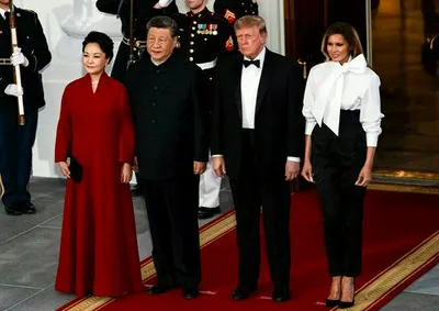 "Donald Trump and Melania Trump welcoming Chinese President Xi Jinping and Madame Peng Liyuan during a state visit"