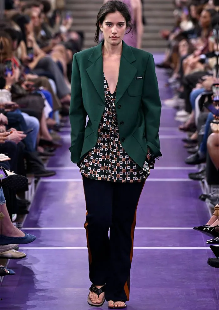 "Ella Bleu Travolta walking the runway at Paris Fashion Week"