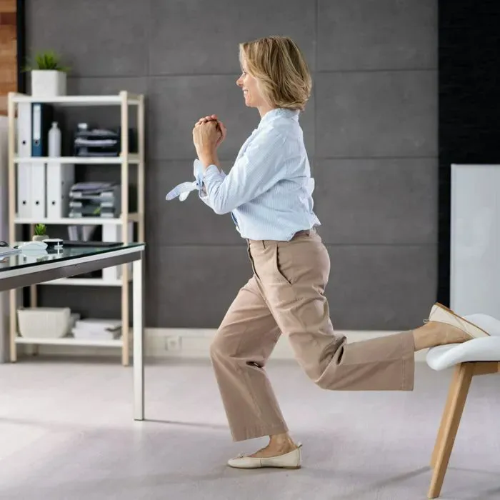 "Woman doing a glute bridge exercise"