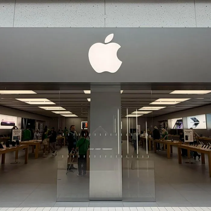 Apple Store exterior showcasing modern architecture and vibrant atmosphere.