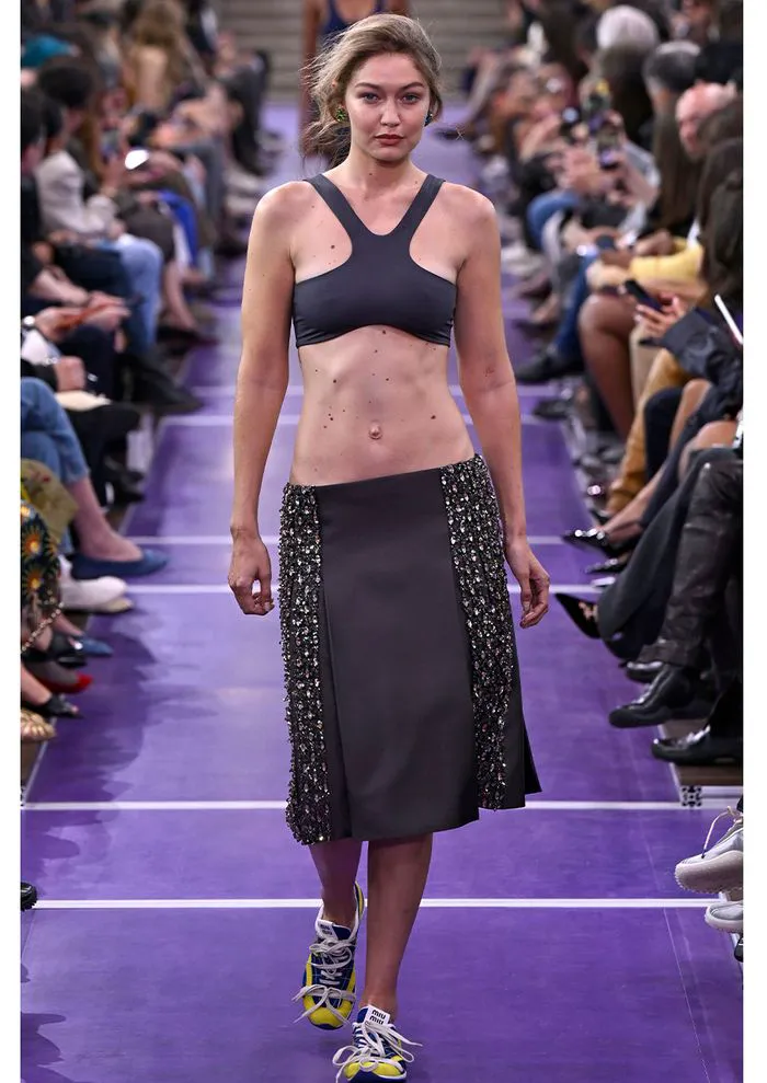 Gigi Hadid walking the runway for Miu Miu