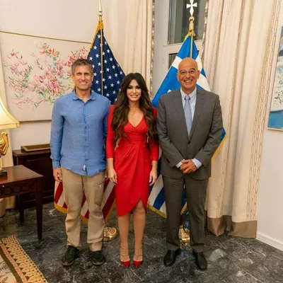 Kimberly Guilfoyle in a red dress