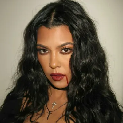 "Kourtney Kardashian's vampire look without bangs"