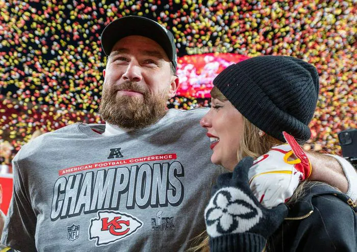 Taylor Swift and Travis Kelce football field